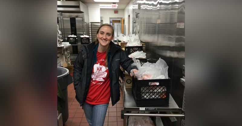 Angela Richey smiling in a school kitchen