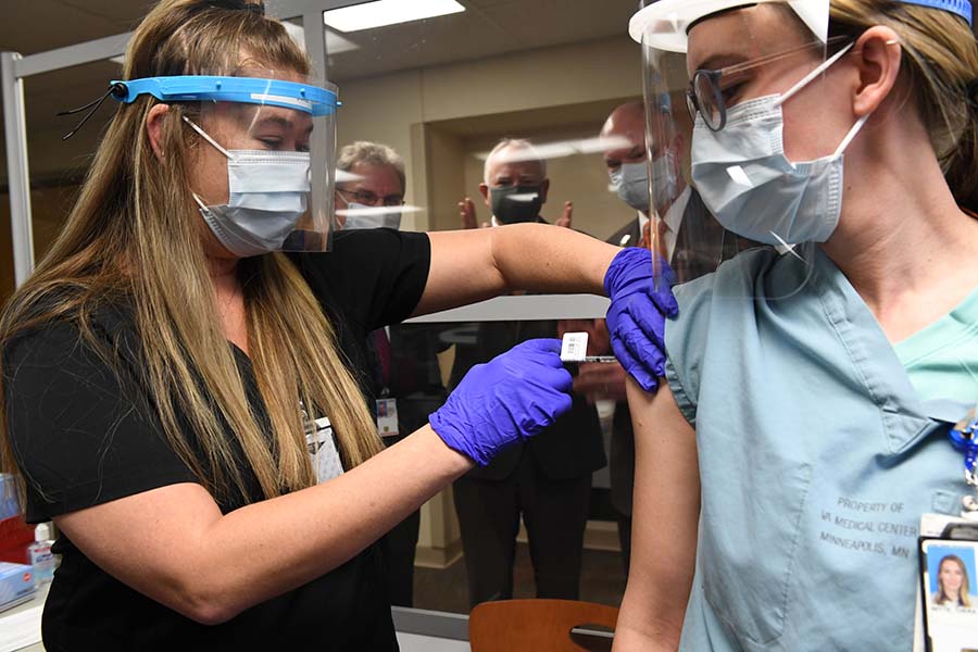 person getting vaccine shot