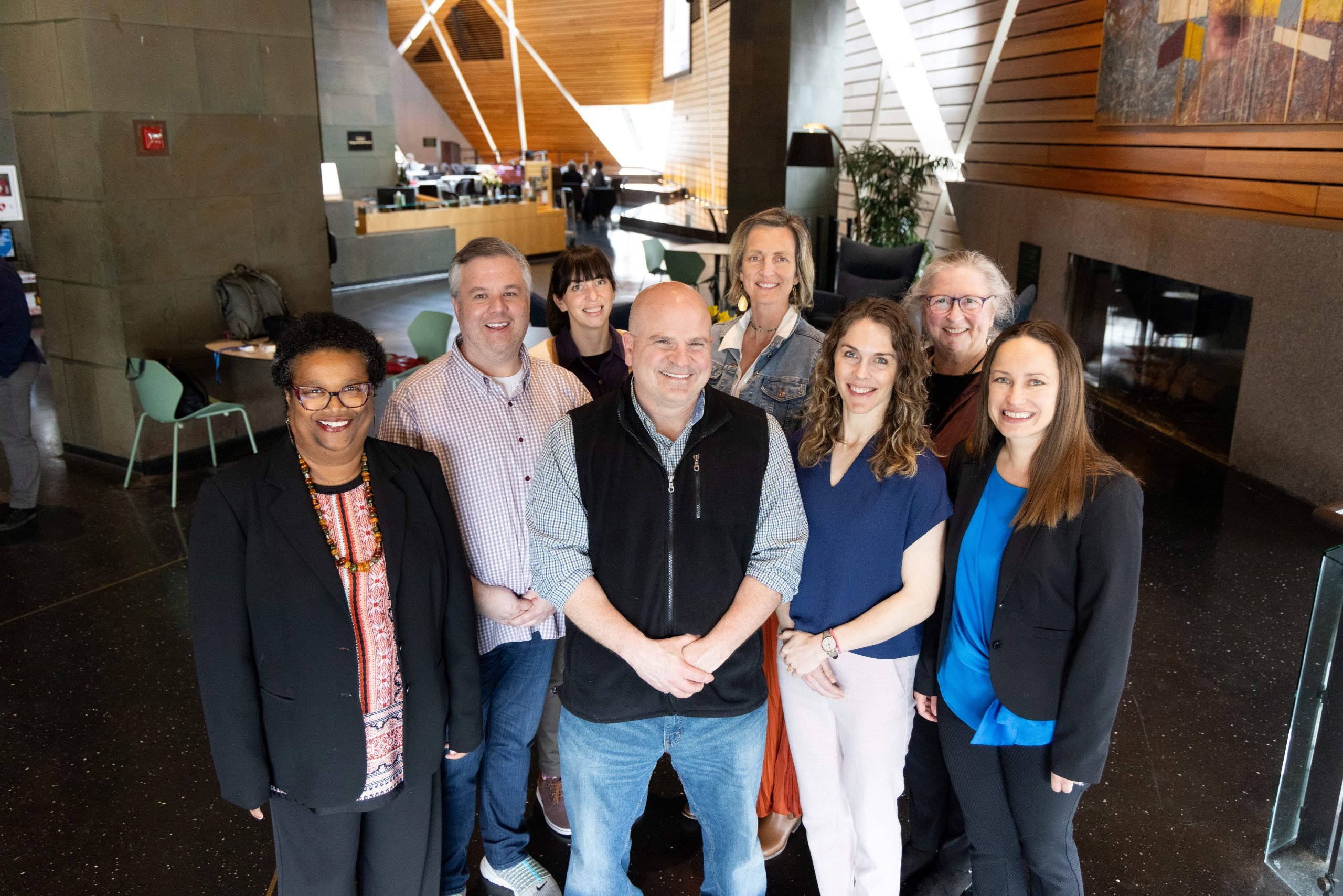 Photo of CHAI Team at the Minnesota Gerontological Society conference. Photographed from left to right: Robbin Frazier, Rajean Moone, Allycia Wolff, Joseph Gaugler, Elma Johnson, Marti DeLiema, Terri Harvath, and Tetyana Shippee