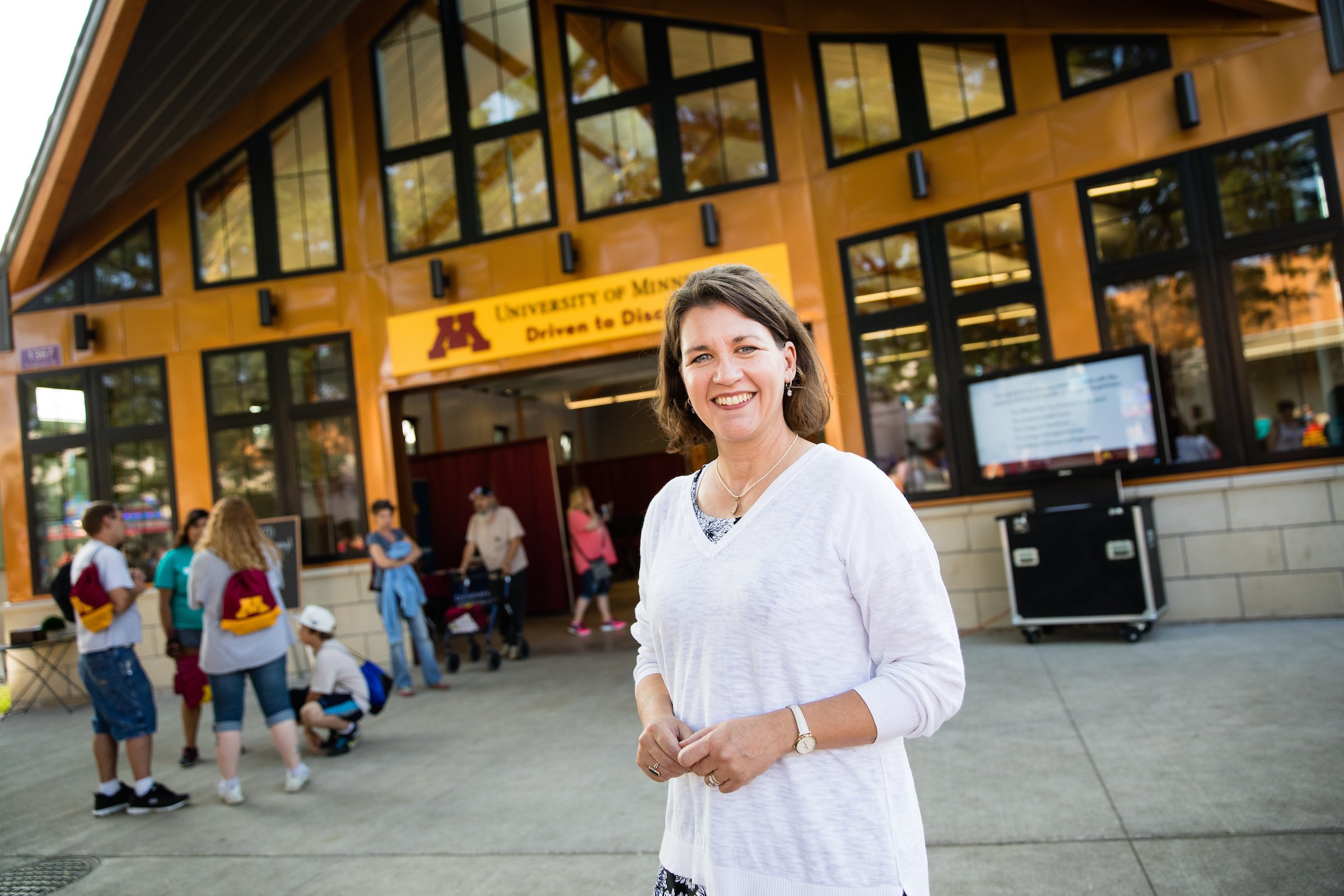 Ellen Demerath in front of the Driven to Discover building at the State Fair