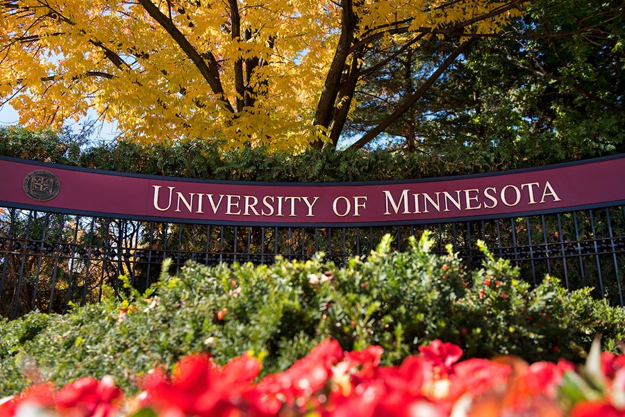 University of Minnesota gate with flowers