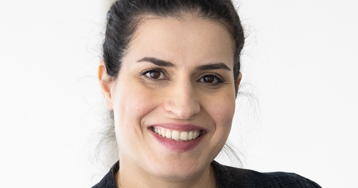 Headshot of Sanaz Sedaghat smiling