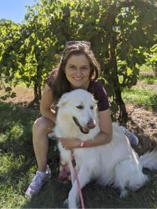 Associate Professor Erika Helgeson with her dog Jordy